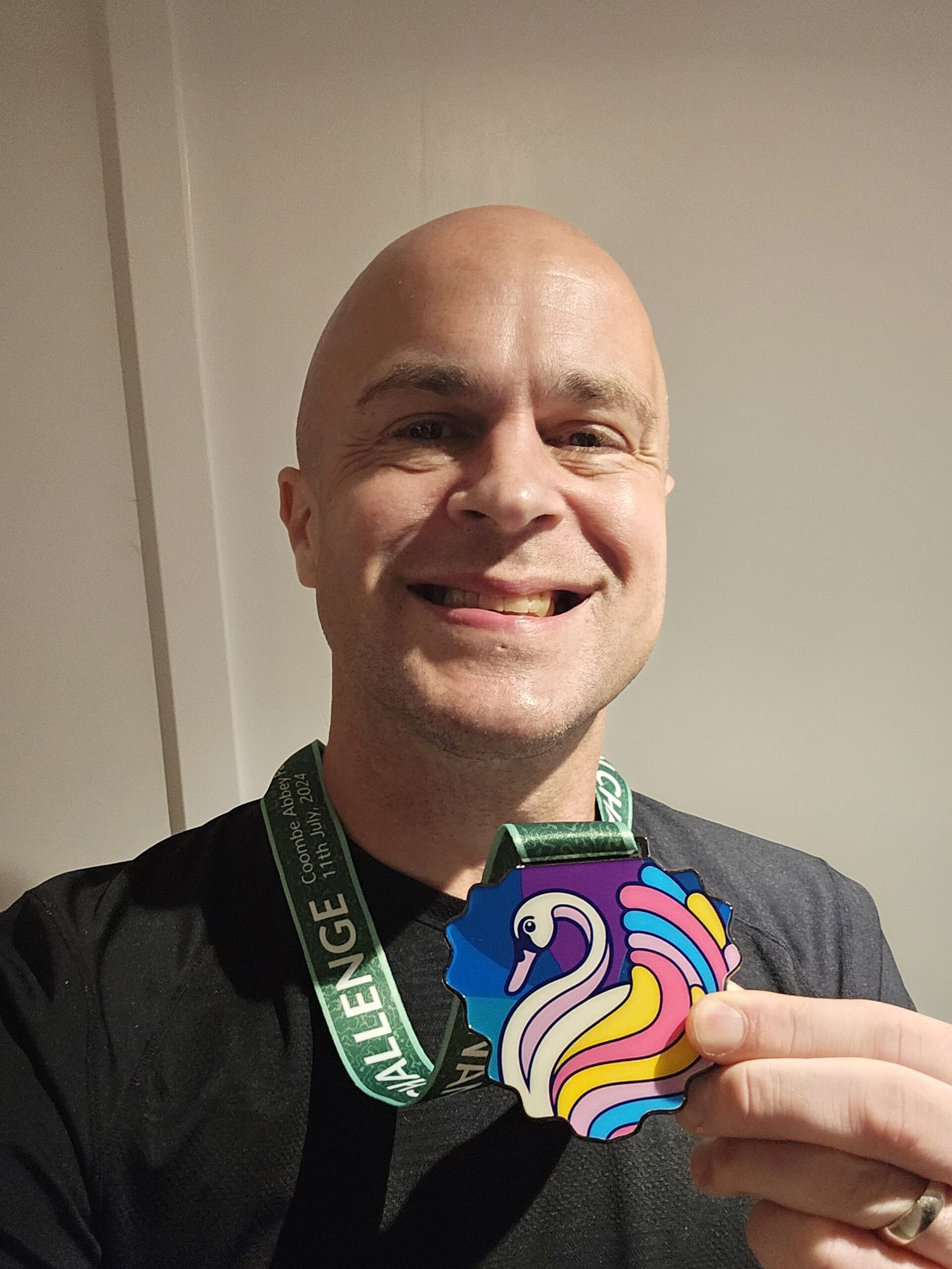 Andy Killworth and running medal